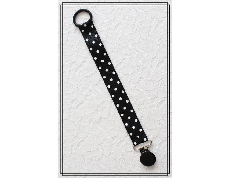 Napphållare svart med vita prickar - svart clip