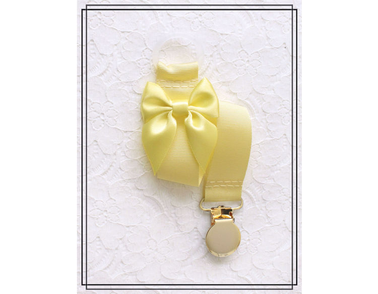 Ljusgul napphållare med citrongul rosett - guld