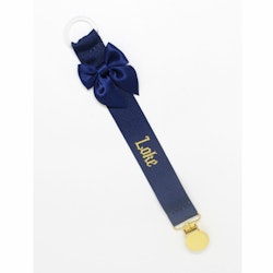 Marinblå napphållare med rosett - guld