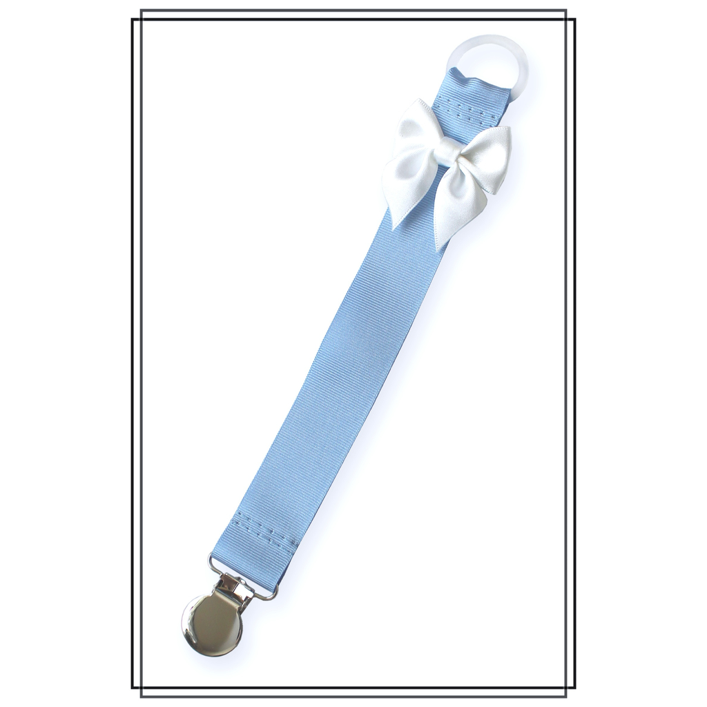 Ljusblå napphållare med vit rosett - silver