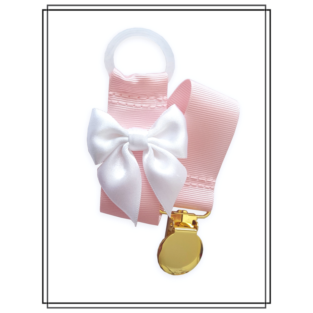 Ljusrosa napphållare med vit rosett - guld
