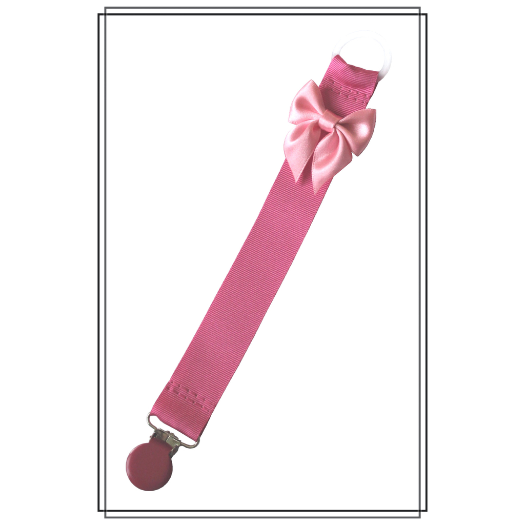 Cerise napphållare med ljusrosa rosett