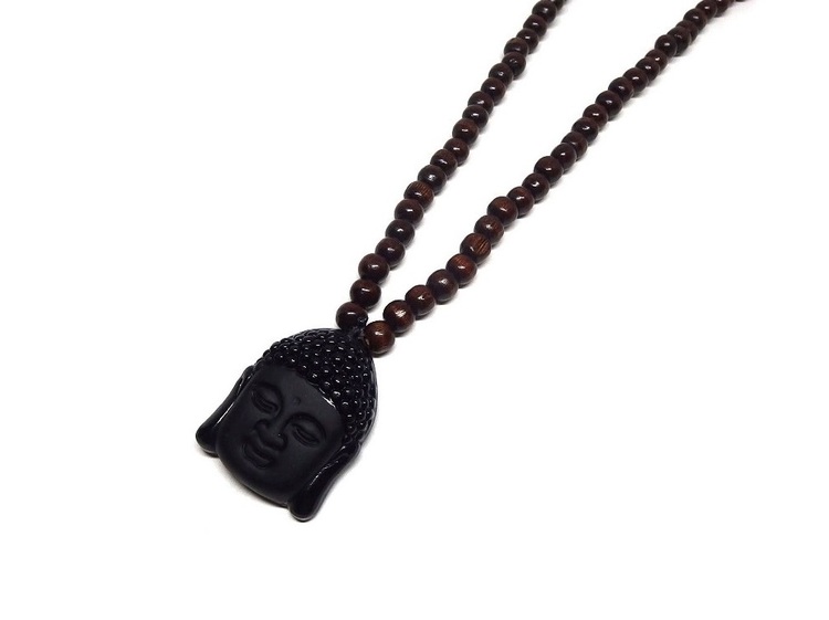 Långt brunt halsband i trä med Buddha huvud i kristall