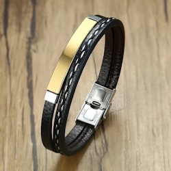 Svart läderarmband med gulddetalj
