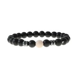 Svart armband med vit sten
