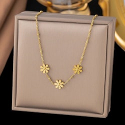 Halsband med tre gyllene blommor