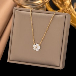 Halsband med pärlemorblomma