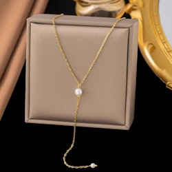 Y-halsband med pärlor i guld