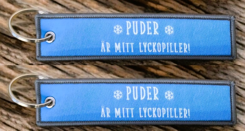 Puder är mitt lyckopiller! Nyckelring/Tag