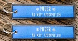 Puder är mitt lyckopiller! Nyckelring/Tag