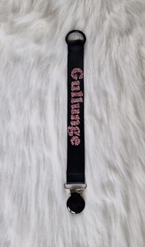 Gullunge rosaglitter, svart clips