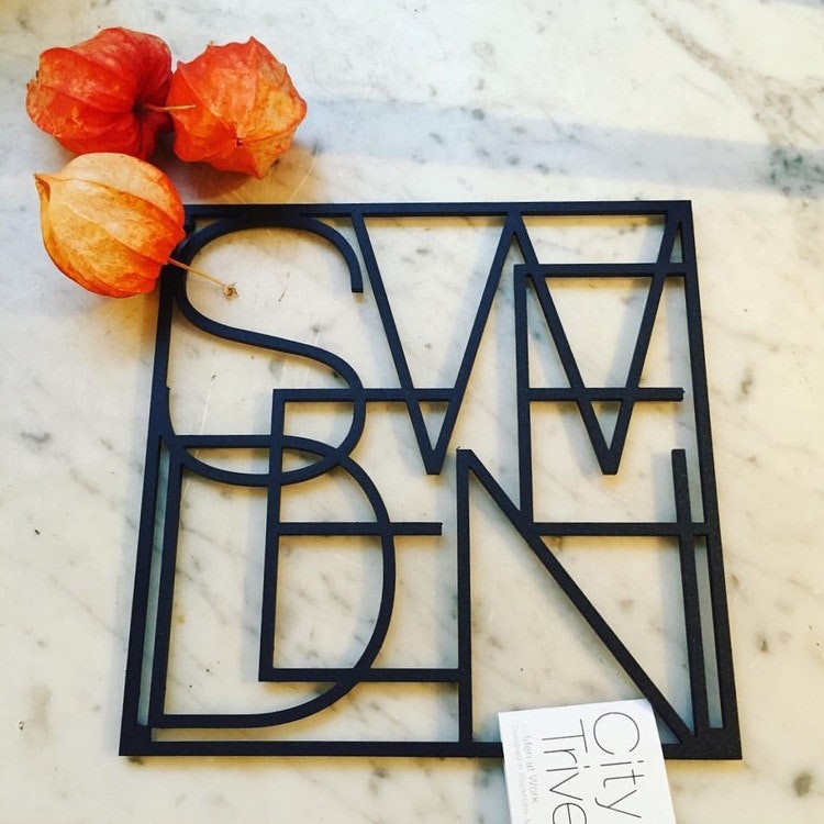 City trivet Sweden-Men at Work