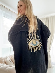 Muslinskjorta evil eye