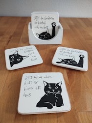 Glasunderlägg med lite bevingade ord. 😽