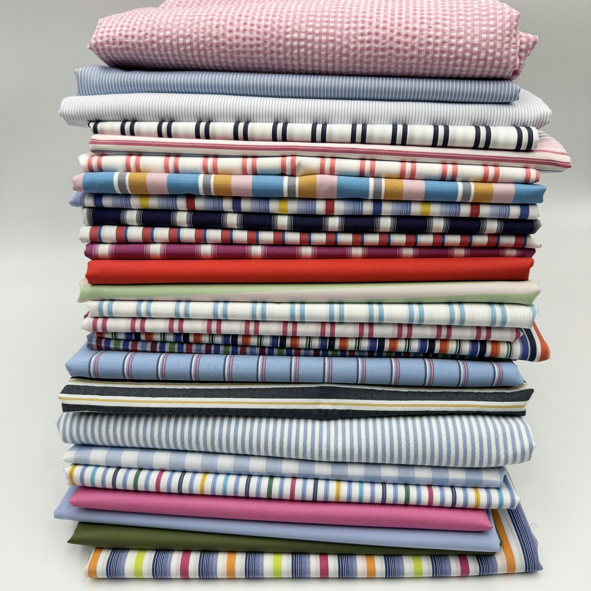 Bomullspoplin vit/lime/orange/cerise rand