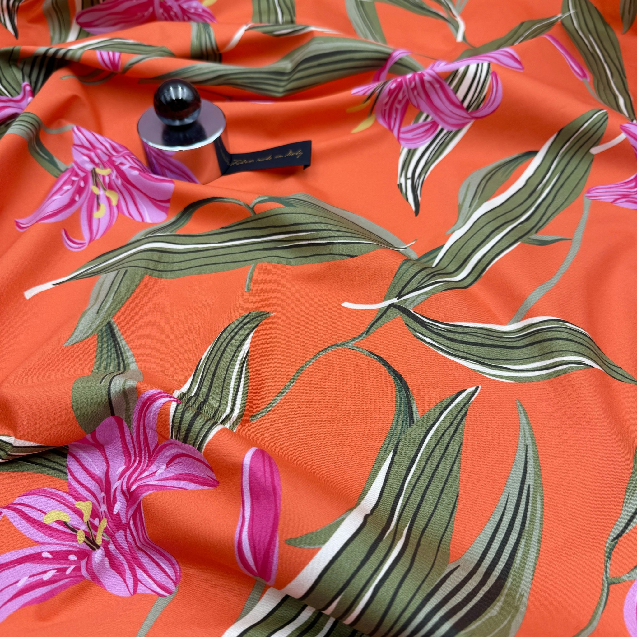 Bomull/elastan orange storblommig Hugo B***