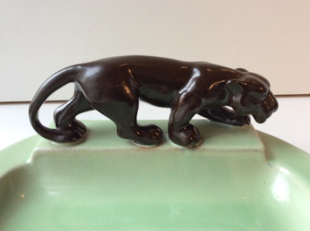 Brown panther on green bowl 52