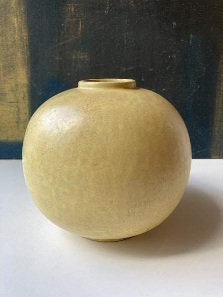 Globe vase with fish relief