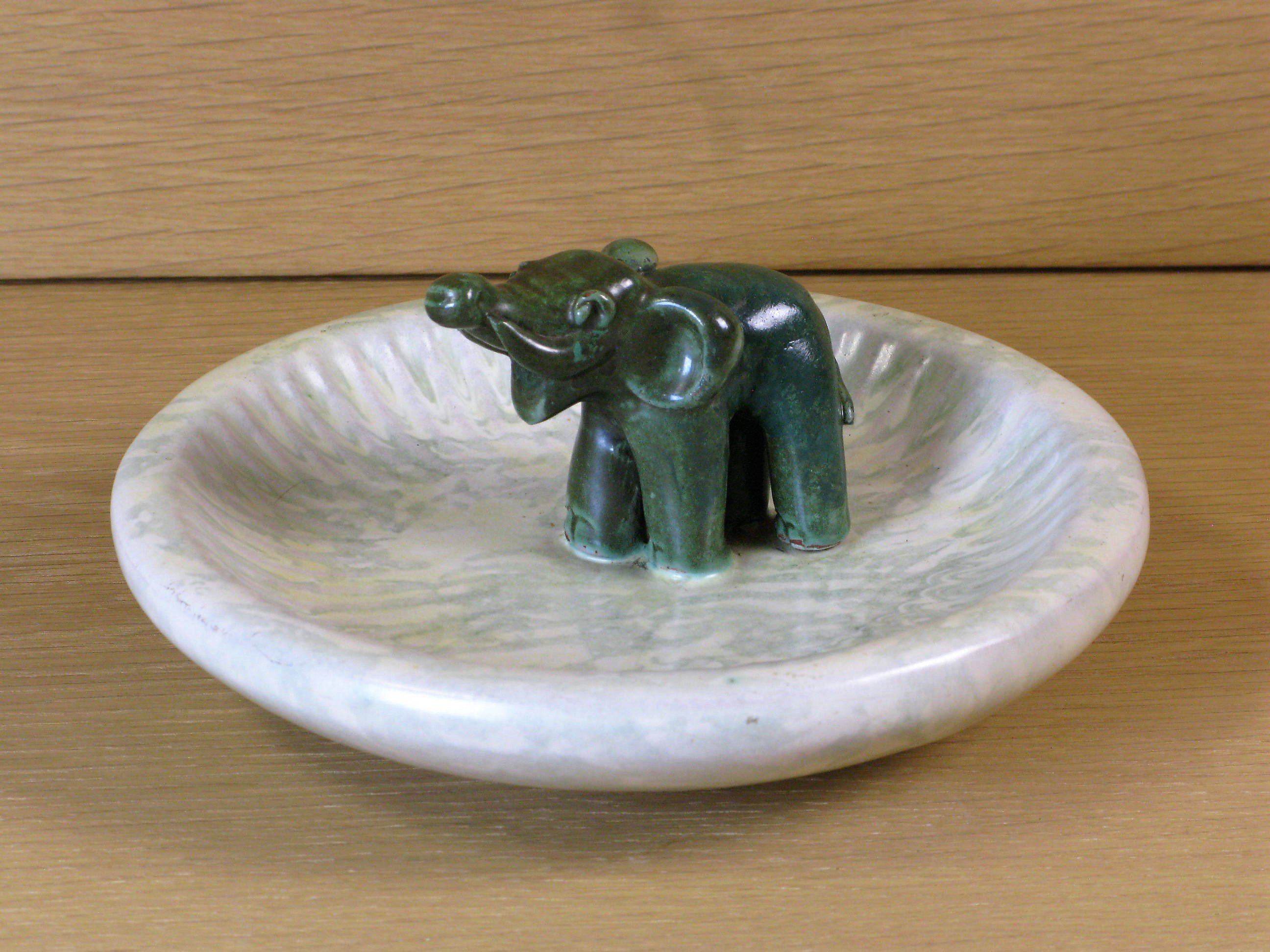 Dish with green elephant