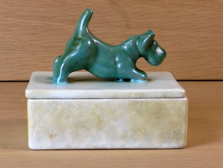 Green dog on a box 2
