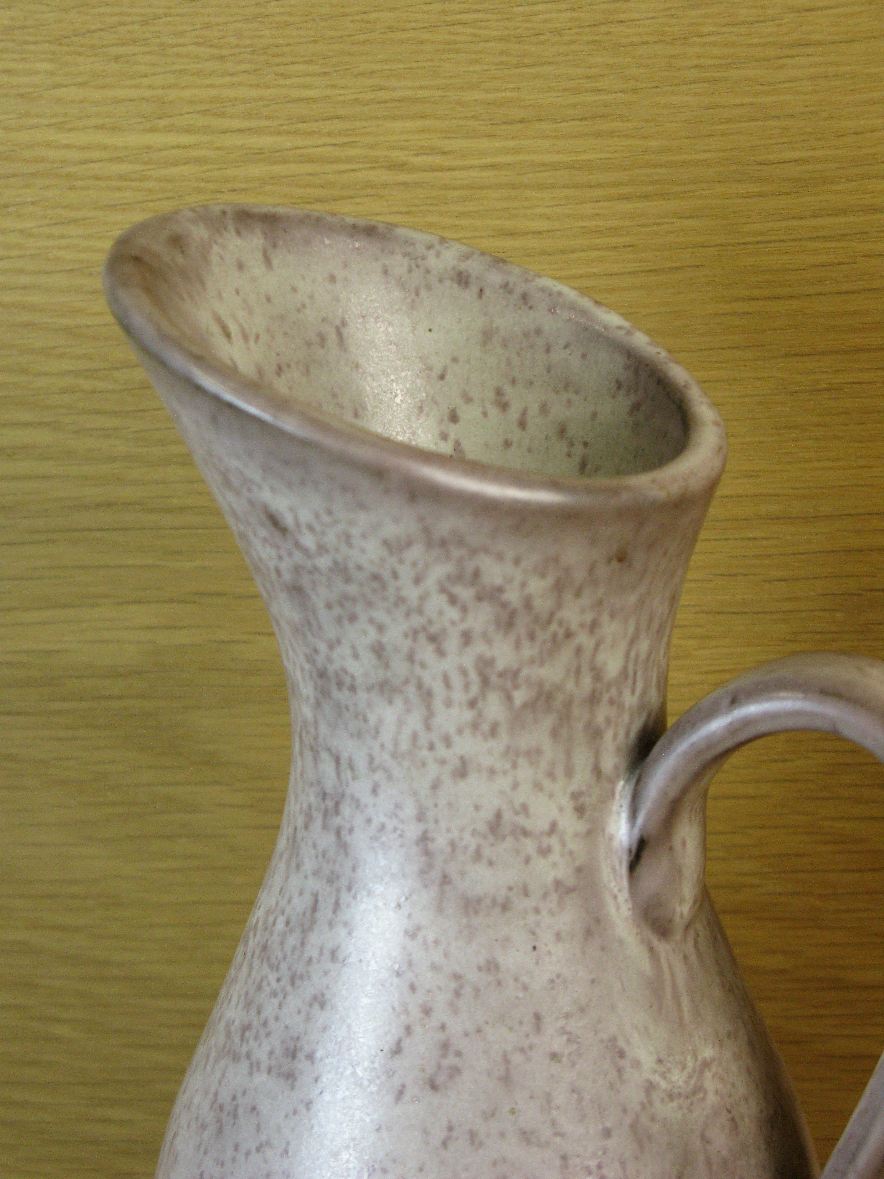 grey pitcher 17