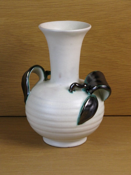 White vase with green handles 224