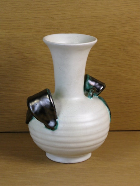 White vase with green handles 224