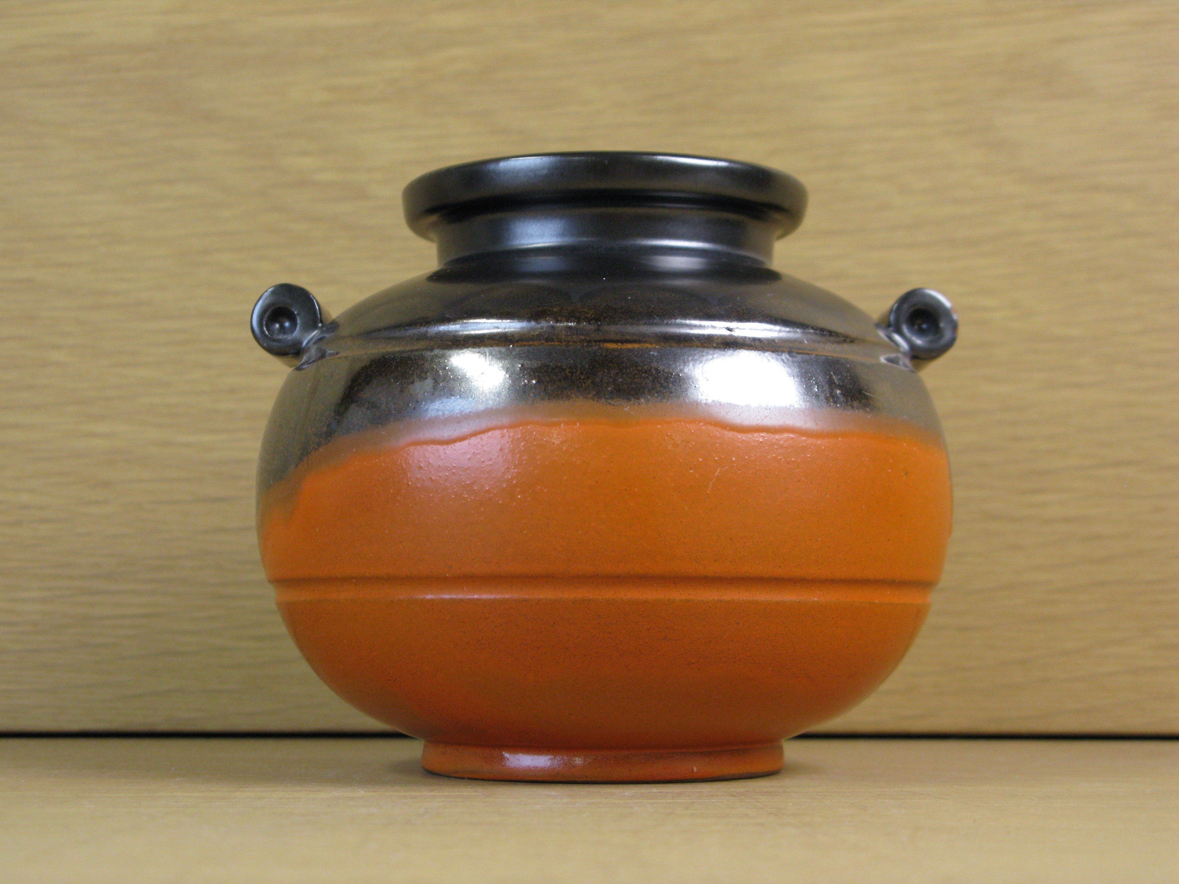 orange/black vase 2750