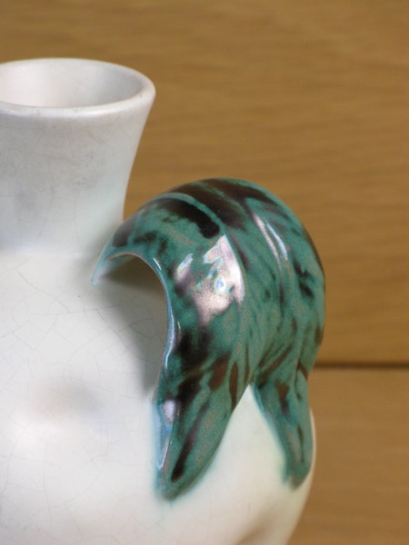 white vase with green handles 190