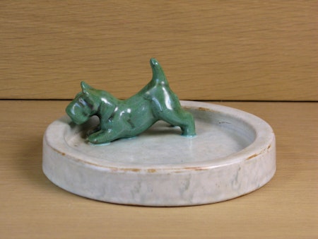 Green dog in a grey bowl nr 15