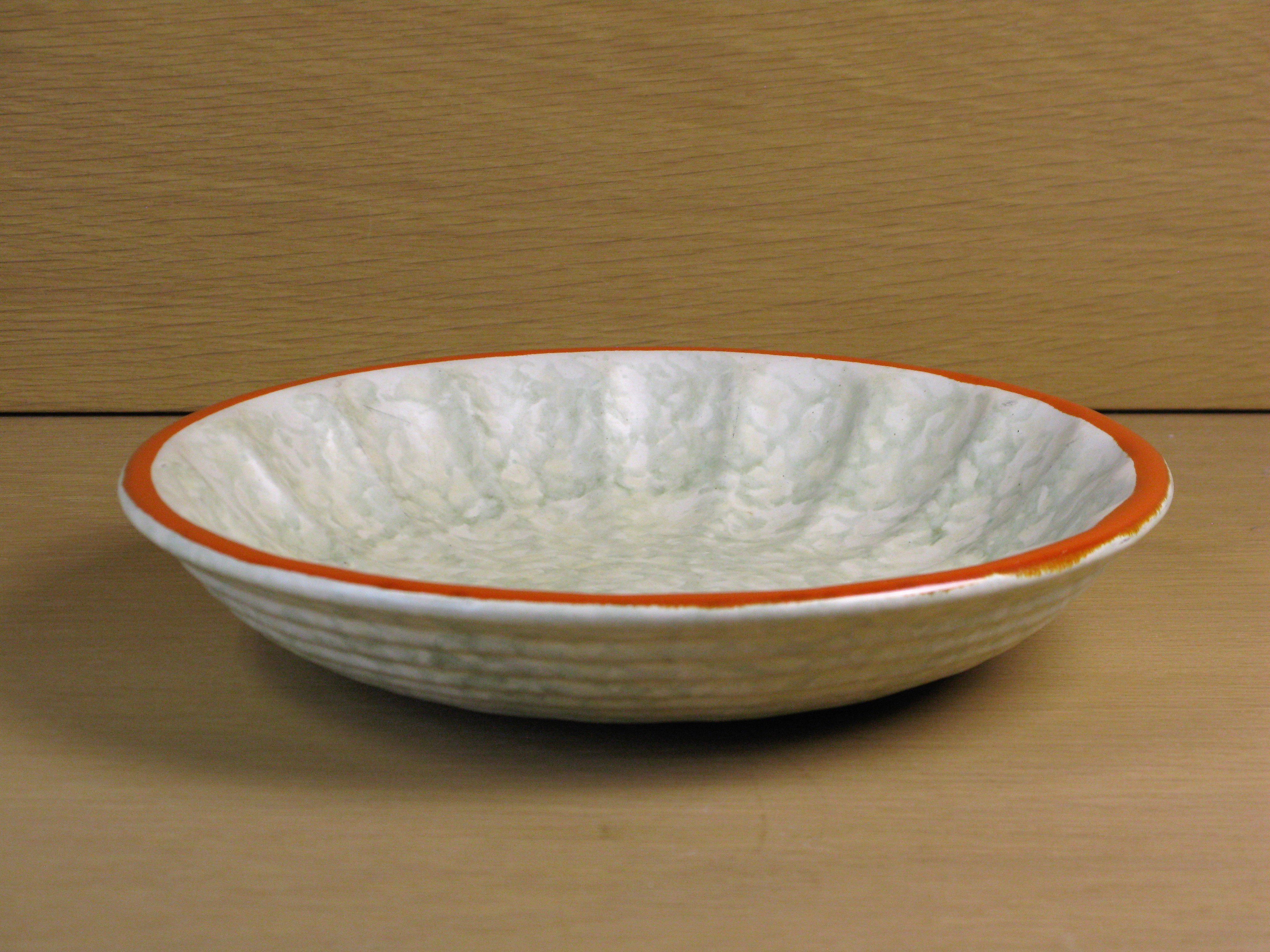 greyish and orange bowl 78