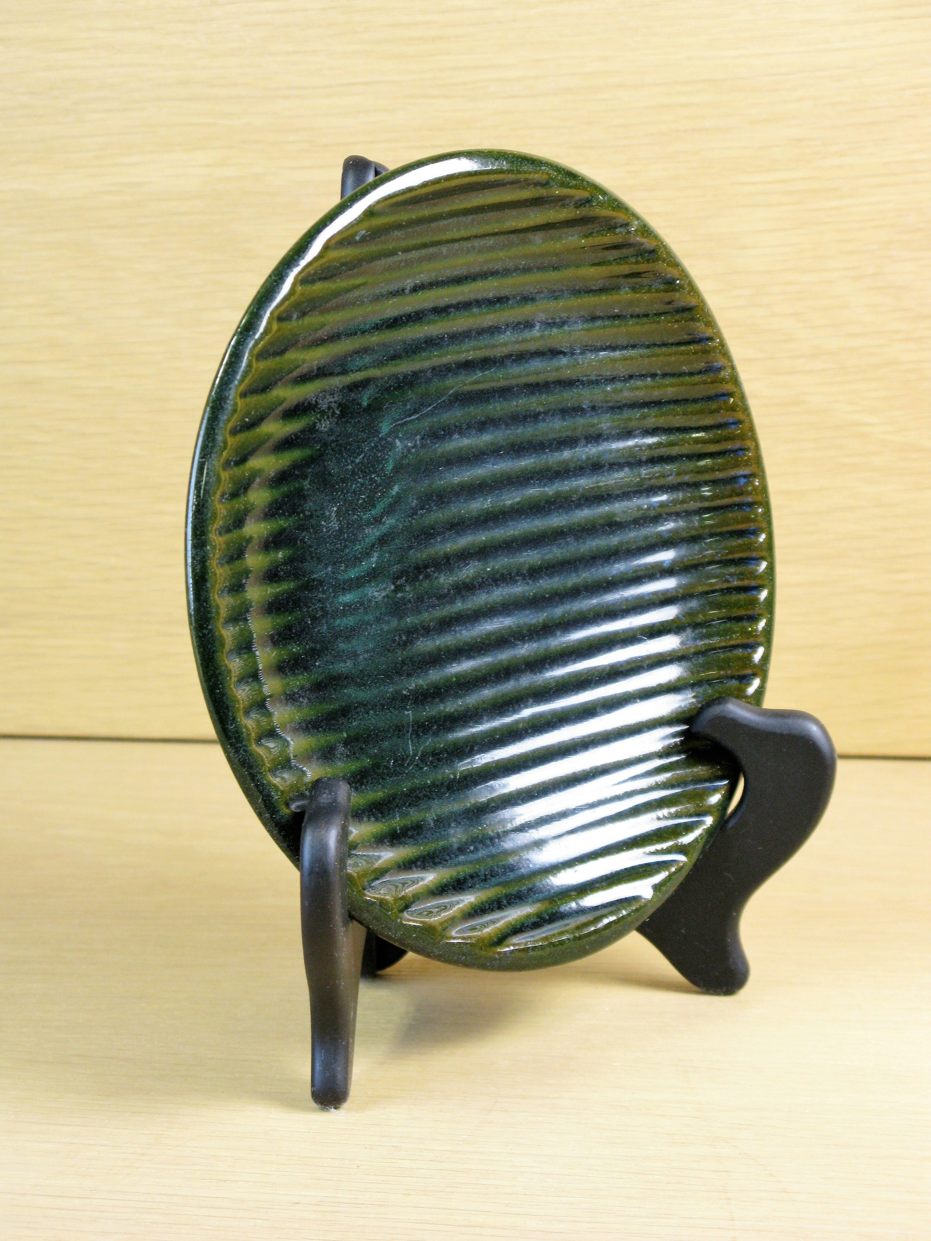 greenish ashtray 61