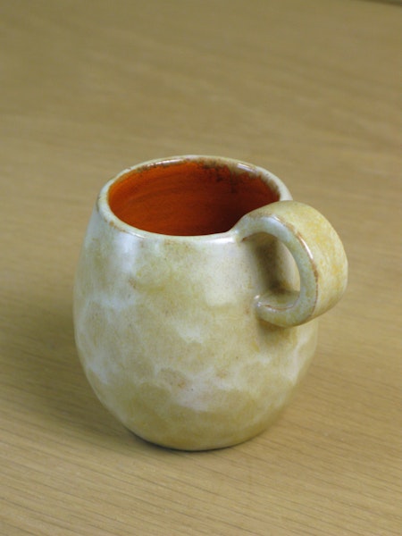yellowish/orange mug 3 sold
