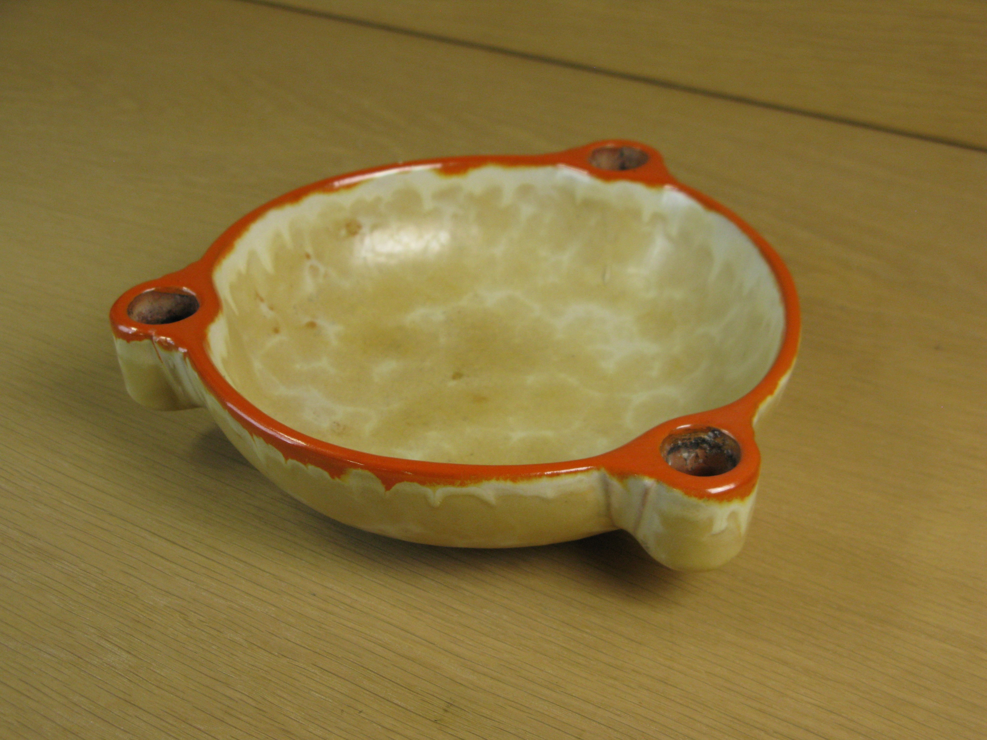yellowish/orange candle bowl 2506