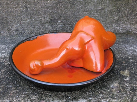 orange elephant in a bowl sold