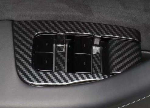 Model 3 fönsterhiss kolfibertrim matt