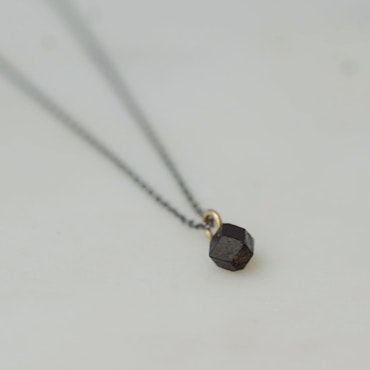 "Mini Abisko" necklace with a raw garnet crystal found in Abisko