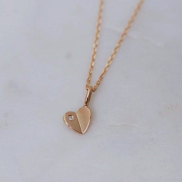 "Lucky Heart" pendant in gold with a diamond