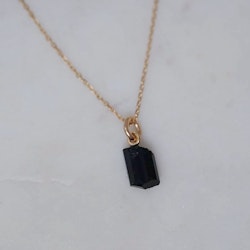 "Råneå" pendant in gold with a raw black tourmaline
