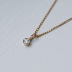 "Twinkle" pendant in gold with a 0.15ct W/SI diamond