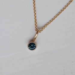 "Twinkle" pendant in gold with a multicolored sapphire