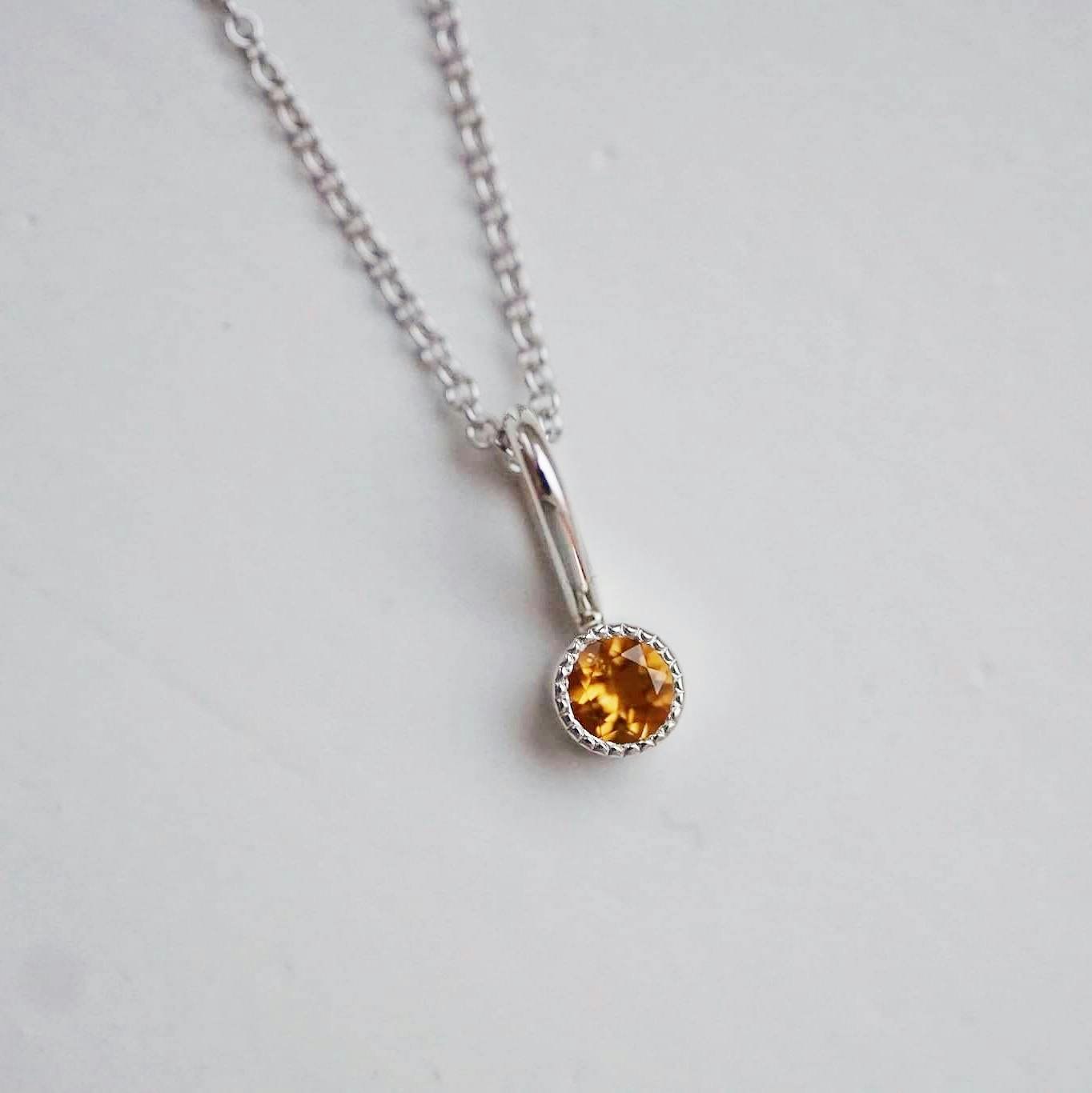 "Twinkle" pendant in silver with a yellow citrine