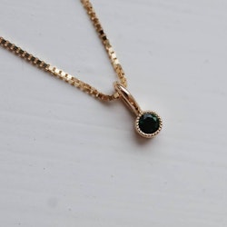 "Twinkle" pendant in gold with a chrome green tourmaline