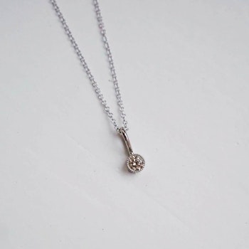 "Twinkle" pendant in white gold with a 0.15ct champagne diamond