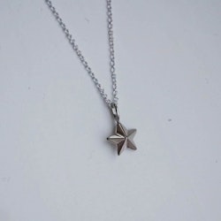 "Star" pendant in white gold