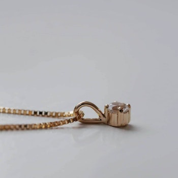 "Swedish Ice" pendant in gold with a swedish rock crystal from Dalarna