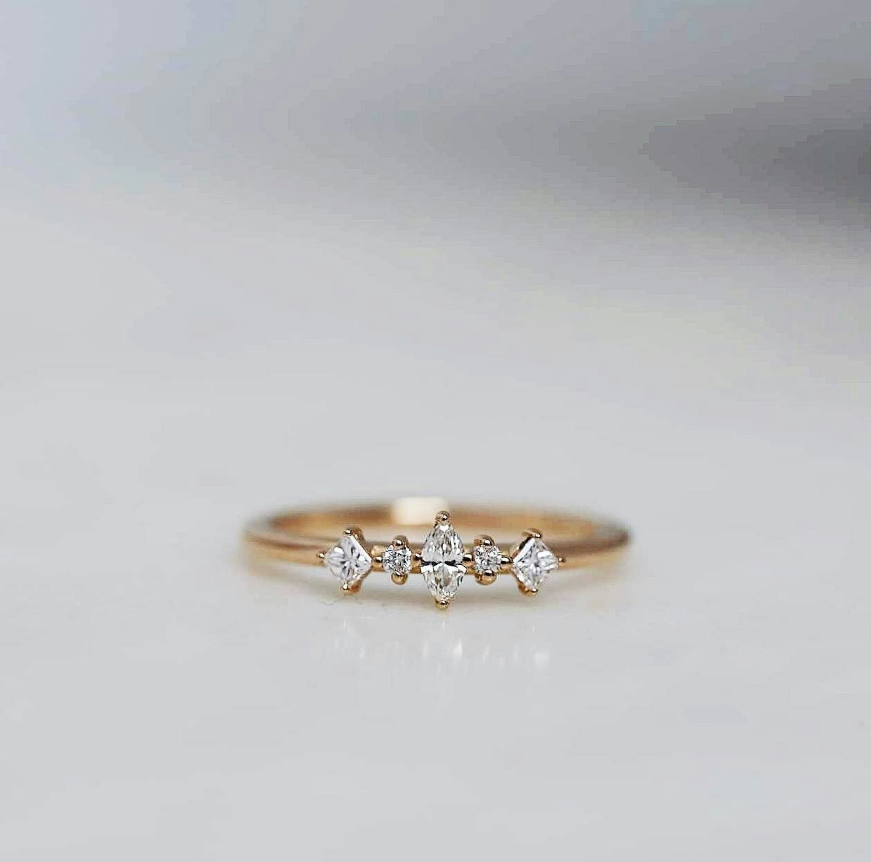 "Iris" ring with diamonds