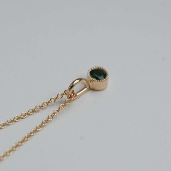 "Twinkle" pendant in gold with a green tourmaline