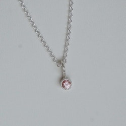 "Twinkle" pendant in silver with a peachpink sapphire
