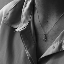 "Swedish Ice" Pendant in gold with a raw Swedish rock crystal